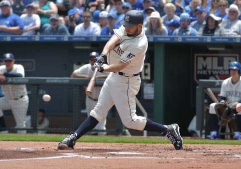 May 15, 2016; Kansas City, MO, USA; Kansas City Royals first baseman Eric Hosmer (35) hits an rbi single in the first inning against the Atlanta Braves at Kauffman Stadium. Mandatory Credit: Denny Medley-USA TODAY Sports