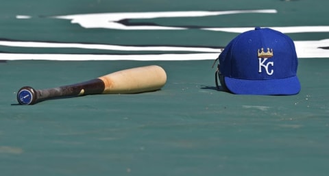 Apr 23, 2016; Kansas City, MO, USA; A general view of a bat and a Royals cap prior to a game between the Kansas City Royals and the Baltimore Orioles at Kauffman Stadium. Mandatory Credit: Peter G. Aiken-USA TODAY Sports