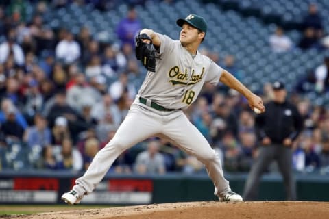 May 23, 2016; Seattle, WA, USA; Oakland Athletics starting pitcher Rich Hill (18) throws against the Seattle Mariners during the second inning at Safeco Field. Mandatory Credit: Joe Nicholson-USA TODAY Sports