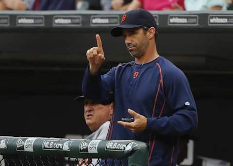 Jun 14, 2016; Chicago, IL, USA; Detroit Tigers manager Brad Ausmus (7) gestures from the dugout during the first inning against the Chicago White Sox at U.S. Cellular Field. Mandatory Credit: Kamil Krzaczynski-USA TODAY Sports