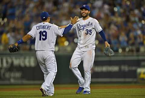 Jun 13, 2016; Kansas City, MO, USA; Kansas City Royals first basemen Eric Hosmer (35) celebrates with third basemen Cheslor Cuthbert (19) after beating the Cleveland Indians 2-1 at Kauffman Stadium. Mandatory Credit: Peter G. Aiken-USA TODAY Sports