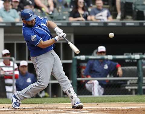 Jun 12, 2016; Chicago, IL, USA; Kansas City Royals designated hitter Kendrys Morales (25) hits RBI single against the Chicago White Sox during the first inning at U.S. Cellular Field. Mandatory Credit: Kamil Krzaczynski-USA TODAY Sports