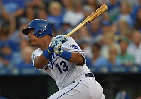 Jun 13, 2016; Kansas City, MO, USA; Kansas City Royals catcher Salvador Perez (13) singles against the Cleveland Indians during the first inning at Kauffman Stadium. Mandatory Credit: Peter G. Aiken-USA TODAY Sports