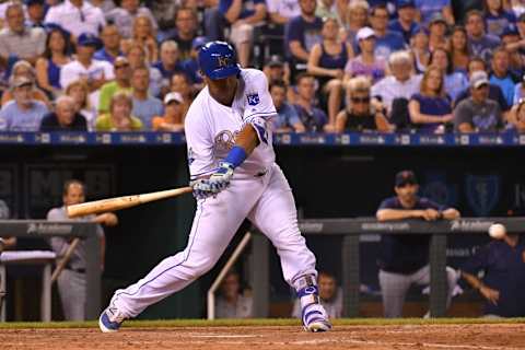 Jun 17, 2016; Kansas City, MO, USA; Kansas City Royals catcher Salvador Perez (13) hits a two run double in the seventh inning against the Detroit Tigers at Kauffman Stadium. The Royals won 10-3. Mandatory Credit: Denny Medley-USA TODAY Sports