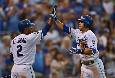 Jun 13, 2016; Kansas City, MO, USA; Kansas City Royals second basemen Whit Merrifield (15) celebrates with teammate Alcides Escobar (2) after hitting a solo home run against the Cleveland Indians during the fourth inning at Kauffman Stadium. Mandatory Credit: Peter G. Aiken-USA TODAY Sports