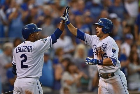 Jun 13, 2016; Kansas City, MO, USA; Kansas City Royals second basemen Whit Merrifield (15) celebrates with teammate Alcides Escobar (2) after hitting a solo home run against the Cleveland Indians during the fourth inning at Kauffman Stadium. Mandatory Credit: Peter G. Aiken-USA TODAY Sports