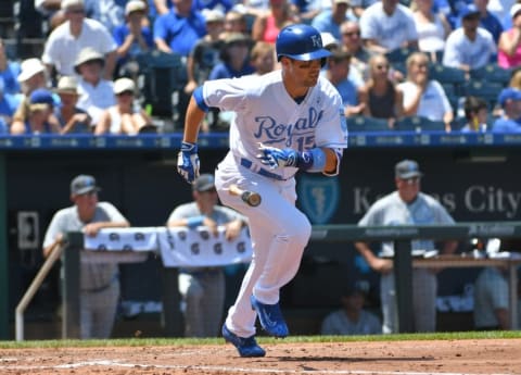 Jun 19, 2016; Kansas City, MO, USA; Kansas City Royals second baseman Whit Merrifield (15) connects for a single in the fourth inning against the Detroit Tigers at Kauffman Stadium. Mandatory Credit: Denny Medley-USA TODAY Sports