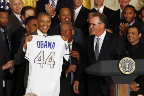 Jul 21, 2016; Washington, DC, USA; Kansas City Royals manager Ned Yost (R) presents President Barack Obama an honorary jersey at a ceremony honoring the world series champion Royals in the East Room at the White House. Mandatory Credit: Geoff Burke-USA TODAY NETWORK