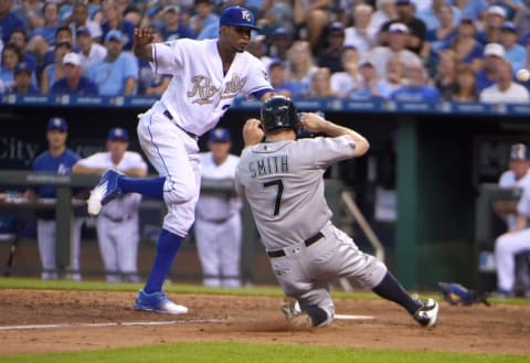 Jul 8, 2016; Kansas City, MO, USA; Seattle Mariners right fielder Seth Smith (7) scores against Kansas City Royals starting pitcher Yordano Ventura (30) on a wild pitch in the sixth inning at Kauffman Stadium. Mandatory Credit: John Rieger-USA TODAY Sports