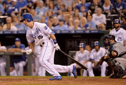 Jul 7, 2016; Kansas City, MO, USA; Kansas City Royals second baseman Whit Merrifield (15) connects for a double in the ninth inning against the Seattle Mariners at Kauffman Stadium. The Royals won 4-3. Mandatory Credit: Denny Medley-USA TODAY Sports