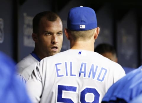 Aug 1, 2016; St. Petersburg, FL, USA; Kansas City Royals starting pitcher Danny Duffy (41) talks with pitching coach Dave Eiland (58) in the dugout against the Tampa Bay Rays at Tropicana Field. Kansas City Royals defeated the Tampa Bay Rays 3-0. Mandatory Credit: Kim Klement-USA TODAY Sports