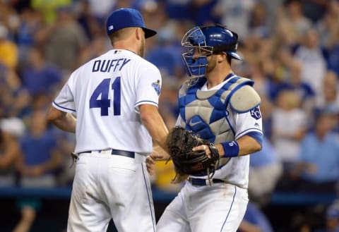 Aug 11, 2016; Kansas City, MO, USA; Kansas City Royals relief pitcher Danny Duffy (41) celebrates with catcher Drew Butera (9) after the game against the Chicago White Sox at Kauffman Stadium. Kansas City won the game 2-1. Mandatory Credit: John Rieger-USA TODAY Sports