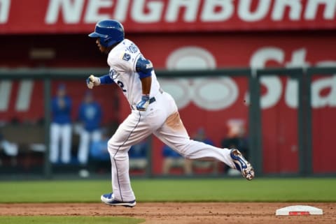 Oct 9, 2015; Kansas City, MO, USA; Kansas City Royals shortstop Alcides Escobar heads to third base on a triple against the Houston Astros in the 7th inning in game two of the ALDS at Kauffman Stadium. Mandatory Credit: Peter G. Aiken-USA TODAY Sports