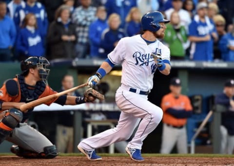 Oct 9, 2015; Kansas City, MO, USA; Kansas City Royals second baseman Ben Zobrist hits a RBI single against the Houston Astros in the 7th inning in game two of the ALDS at Kauffman Stadium. Mandatory Credit: Peter G. Aiken-USA TODAY Sports