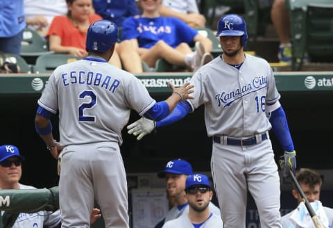 May 14, 2015; Arlington, TX, USA; Kansas City Royals shortstop Alcides Escobar (2) celebrates with right fielder Paulo Orlando (16) after scoring during the first inning at Globe Life Park in Arlington. Mandatory Credit: Kevin Jairaj-USA TODAY Sports