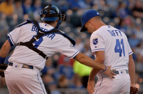 Sep 29, 2016; Kansas City, MO, USA; Kansas City Royals catcher Drew Butera (9) makes a visit with starting pitcher Danny Duffy (41) in the first inning against the Minnesota Twins at Kauffman Stadium. Mandatory Credit: Denny Medley-USA TODAY Sports