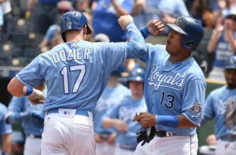 KANSAS CITY, MO – JUNE 17: Hunter Dozier #17 of the Kansas City Royals celebrates his two-run home run with Salvador Perez #13 in the third inning against the Houston Astros at Kauffman Stadium on June 17, 2018 in Kansas City, Missouri. (Photo by Ed Zurga/Getty Images)