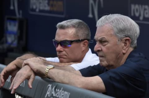 KANSAS CITY, MO – SEPTEMBER 05: Dayton Moore, left, general manager of the Kansas City Royals talks with owner and Chief Executive Officer David Glass during batting practice at Kauffman Stadium on September 5, 2015 in Kansas City, Missouri. (Photo by Reed Hoffmann/Getty Images)