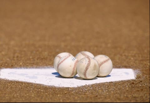 10 Mar 1998: A general view of a group of baseballs on home plate during a spring training game against the Kansas City Royals and the New York Yankees at Baseball City Stadium in Davenport, Florida. The Yankees tied the Royals 6-6.