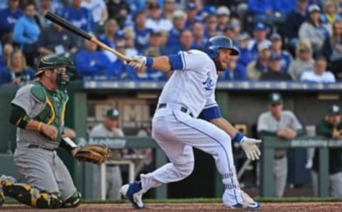 Apr 10, 2017; Kansas City, MO, USA; Kansas City Royals left fielder Alex Gordon (4) at bat against the Oakland Athletics during the sixth inning at Kauffman Stadium. Mandatory Credit: Peter G. Aiken-USA TODAY Sports