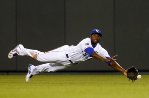 Apr 18, 2017; Kansas City, MO, USA; Kansas City Royals center fielder Lorenzo Cain (6) dives for a ball in the eleventh inning of the game against the San Francisco Giants at Kauffman Stadium. The Giants won 2-1. Mandatory Credit: Jay Biggerstaff-USA TODAY Sports