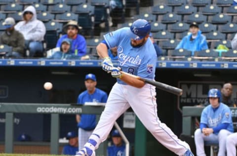 Apr 30, 2017; Kansas City, MO, USA; Kansas City Royals third baseman Mike Moustakas (8) connects for a single in the ninth inning against the Minnesota Twins at Kauffman Stadium. Minnesota won 7-5. Mandatory Credit: Denny Medley-USA TODAY Sports