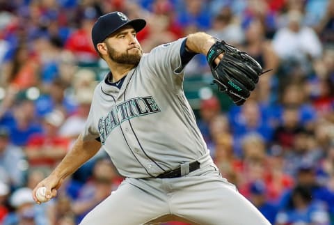 Jun 4, 2016; Arlington, TX, USA; Seattle Mariners starting pitcher Nathan Karns (13) delivers to the plate against the Texas Rangers at Globe Life Park in Arlington. Rangers won 10-4. Mandatory Credit: Ray Carlin-USA TODAY Sports