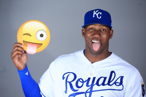 Feb 20, 2017; Surprise, AZ, USA; Kansas City Royals outfielder Jorge Soler (12) poses with an emoji during spring training photo day at Surprise Stadium. Mandatory Credit: Allan Henry-USA TODAY Sports