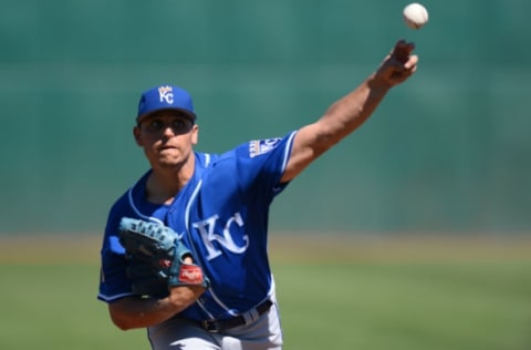 Mar 11, 2017; Goodyear, AZ, USA; Kansas City Royals starting pitcher Jason Vargas (51) pitches against the Cleveland Indians during the first inning at Goodyear Ballpark. Mandatory Credit: Joe Camporeale-USA TODAY Sports