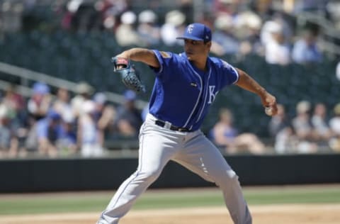 Mar 27, 2017; Mesa, AZ, USA; Kansas City Royals starting pitcher Jason Vargas (51) throws in the first inning during a spring training game against the Oakland Athletics at HoHoKam Stadium. Mandatory Credit: Rick Scuteri-USA TODAY Sports