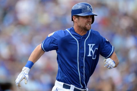 Mar 5, 2016; Surprise, AZ, USA; Kansas City Royals center fielder Bubba Starling (11) runs to first base after hitting a pitch in the second inning against the Chicago White Sox at Surprise Stadium. Mandatory Credit: Joe Camporeale-USA TODAY Sports