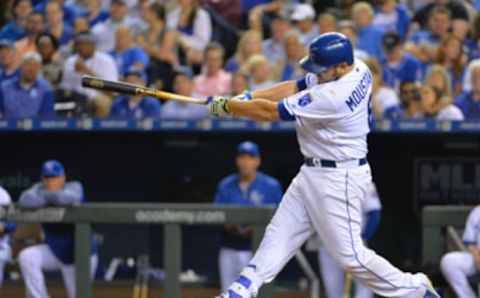 Apr 19, 2017; Kansas City, MO, USA; Kansas City Royals third baseman Mike Moustakas (8) connects for a one run single in the fourth inning against the San Francisco Giants at Kauffman Stadium. Mandatory Credit: Denny Medley-USA TODAY Sports