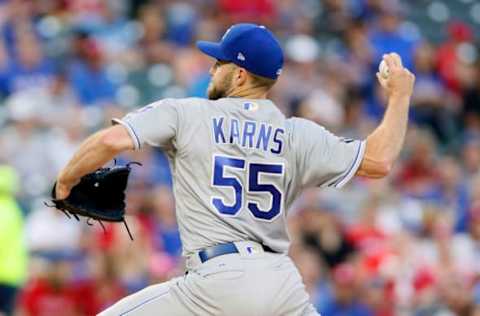 Apr 21, 2017; Arlington, TX, USA; Kansas City Royals starting pitcher Nathan Karns (55) walks off the mound after being relieved Kansas City Royals manager Ned Yost (3) in the fifth inning at Globe Life Park in Arlington. Mandatory Credit: Tim Heitman-USA TODAY Sports