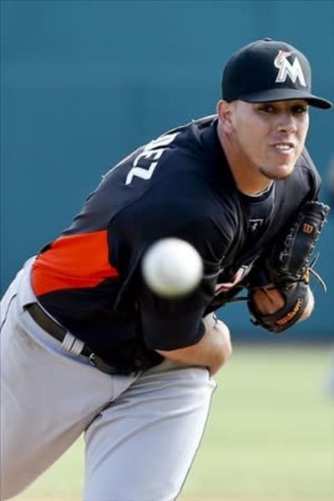 Mar 9, 2013; Melbourne, FL, USA; Miami Marlins pitcher Jose Fernandez throws against the Washington Nationals during the bottom of the sixth inning of a spring training game at Space Coast Stadium. Mandatory Credit: Derick E. Hingle-USA TODAY Sports