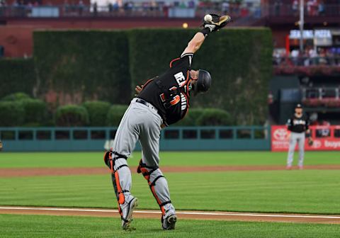 PHILADELPHIA, PA – AUGUST 04: J.T. Realmuto #11 of the Miami Marlins is unable to hold onto a foul ball in the first inning against the Philadelphia Phillies at Citizens Bank Park on August 4, 2018 in Philadelphia, Pennsylvania. (Photo by Drew Hallowell/Getty Images)