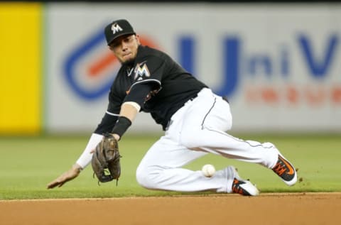 MIAMI, FL – AUGUST 11: Miguel Rojas #19 of the Miami Marlins fields a groundball in the first inning against the New York Mets at Marlins Park on August 11, 2018 in Miami, Florida. (Photo by Michael Reaves/Getty Images)