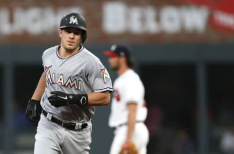 ATLANTA, GA – AUGUST 14: J.T. Realmuto #11 of the Miami Marlins runs past second base after hitting a 2-run home run in the third inning during the game against the Atlanta Braves at SunTrust Park on August 14, 2018 in Atlanta, Georgia. (Photo by Mike Zarrilli/Getty Images)