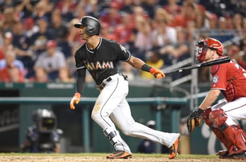 WASHINGTON, DC – AUGUST 18: Isaac Galloway #79 of the Miami Marlins singles in tow run in the teeth inning during a baseball game against the Washington Nationals at Nationals Park on August 18, 2018 in Washington, DC. (Photo by Mitchell Layton/Getty Images)