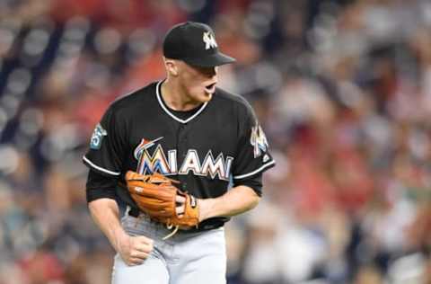 WASHINGTON, DC – AUGUST 18: Brett Graves #53 of the Miami Marlins celebrates a win and collects his first save of the year after a baseball game against the Washington Nationals at Nationals Park on August 18, 2018 in Washington, DC. (Photo by Mitchell Layton/Getty Images)