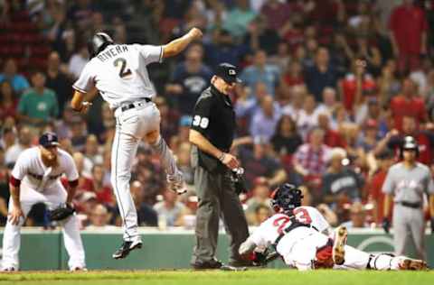 BOSTON, MA – AUGUST 28: Craig Kimbrel #46 of the Boston Red Sox looks on as Yadiel Rivera #2 of the Miami Marlins slides safely into home plate under the tag of Blake Swihart #23 of the Boston Red Sox in the ninth inning to take the lead at Fenway Park on August 28, 2018 in Boston, Massachusetts. (Photo by Adam Glanzman/Getty Images)