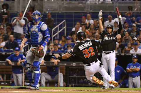 MIAMI, FL – AUGUST 31: Derek Dietrich #32 of the Miami Marlins scores a run in the third inning against the Toronto Blue Jays at Marlins Park on August 31, 2018 in Miami, Florida. (Photo by Mark Brown/Getty Images)