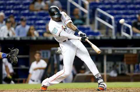 MIAMI, FL – SEPTEMBER 02: Lewis Brinson #9 of the Miami Marlins hits a double in the ninth inning against the Toronto Blue Jays at Marlins Park on September 2, 2018 in Miami, Florida. (Photo by Michael Reaves/Getty Images)