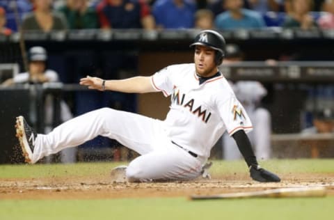 MIAMI, FL – SEPTEMBER 03: Austin Dean #44 of the Miami Marlins slides home safely after scoring a run in the second inning against the Philadelphia Phillies at Marlins Park on September 3, 2018 in Miami, Florida. (Photo by Michael Reaves/Getty Images)