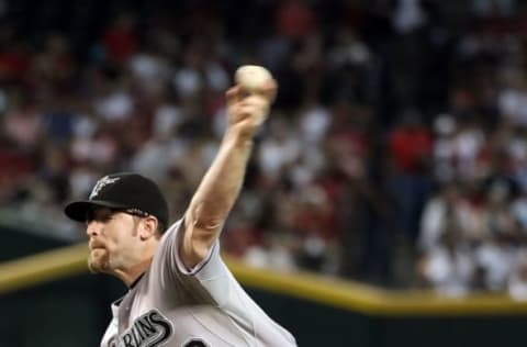 PHOENIX – JULY 10: Starting pitcher Nate Robertson #39 of the Florida Marlins sits in the dugout during the Major League Baseball game against the Arizona Diamondbacks at Chase Field on July 10, 2010 in Phoenix, Arizona. The Diamondbacks defeated the Marlins 5-4. (Photo by Christian Petersen/Getty Images)