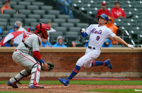 NEW YORK, NY – SEPTEMBER 09: Brandon Nimmo #9 of the New York Mets scores on a double by Austin Jackson #18 as catcher Jorge Alfaro #38 of the Philadelphia Phillies during waits for the throw during the seventh inning of a game at Citi Field on September 9, 2018 in the Flushing neighborhood of the Queens borough of New York City. The Mets defeated the Phillies 6-4. (Photo by Rich Schultz/Getty Images)