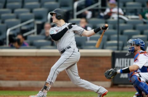 NEW YORK, NY – SEPTEMBER 13: Brian Anderson #15 of the Miami Marlins follows through on a seventh inning ground rule double during the seventh inning against the New York Mets at Citi Field on September 13, 2018 in the Flushing neighborhood of the Queens borough of New York City. (Photo by Jim McIsaac/Getty Images)