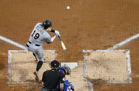 NEW YORK, NY – SEPTEMBER 13: Miguel Rojas #19 of the Miami Marlins connects on a third inning two-run home run against the Miami Marlins in game two of a doubleheader at Citi Field on September 13, 2018 in the Flushing neighborhood of the Queens borough of New York City. (Photo by Jim McIsaac/Getty Images)