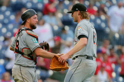 PHILADELPHIA, PA – SEPTEMBER 16: Catcher Bryan Holaday #28 of the Miami Marlins congratulates pitcher Adam Conley #61 after defeating the Philadelphia Phillies 6-4 in a game at Citizens Bank Park on September 16, 2018 in Philadelphia, Pennsylvania. (Photo by Rich Schultz/Getty Images)