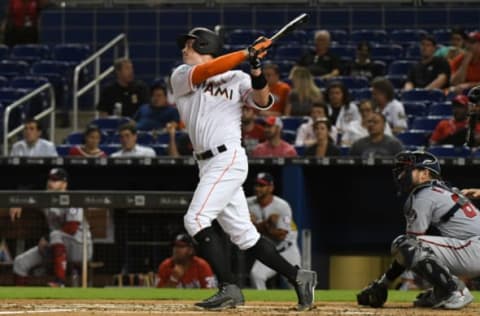 MIAMI, FL – SEPTEMBER 17: Peter O’Brien #45 of the Miami Marlins doubles in the second inning against the Washington Nationals at Marlins Park on September 17, 2018 in Miami, Florida. (Photo by Eric Espada/Getty Images)