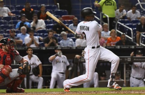 MIAMI, FL – SEPTEMBER 17: Lewis Brinson #9 of the Miami Marlins hits an RBI single in the seventh inning against the Washington Nationals at Marlins Park on September 17, 2018 in Miami, Florida. (Photo by Eric Espada/Getty Images)